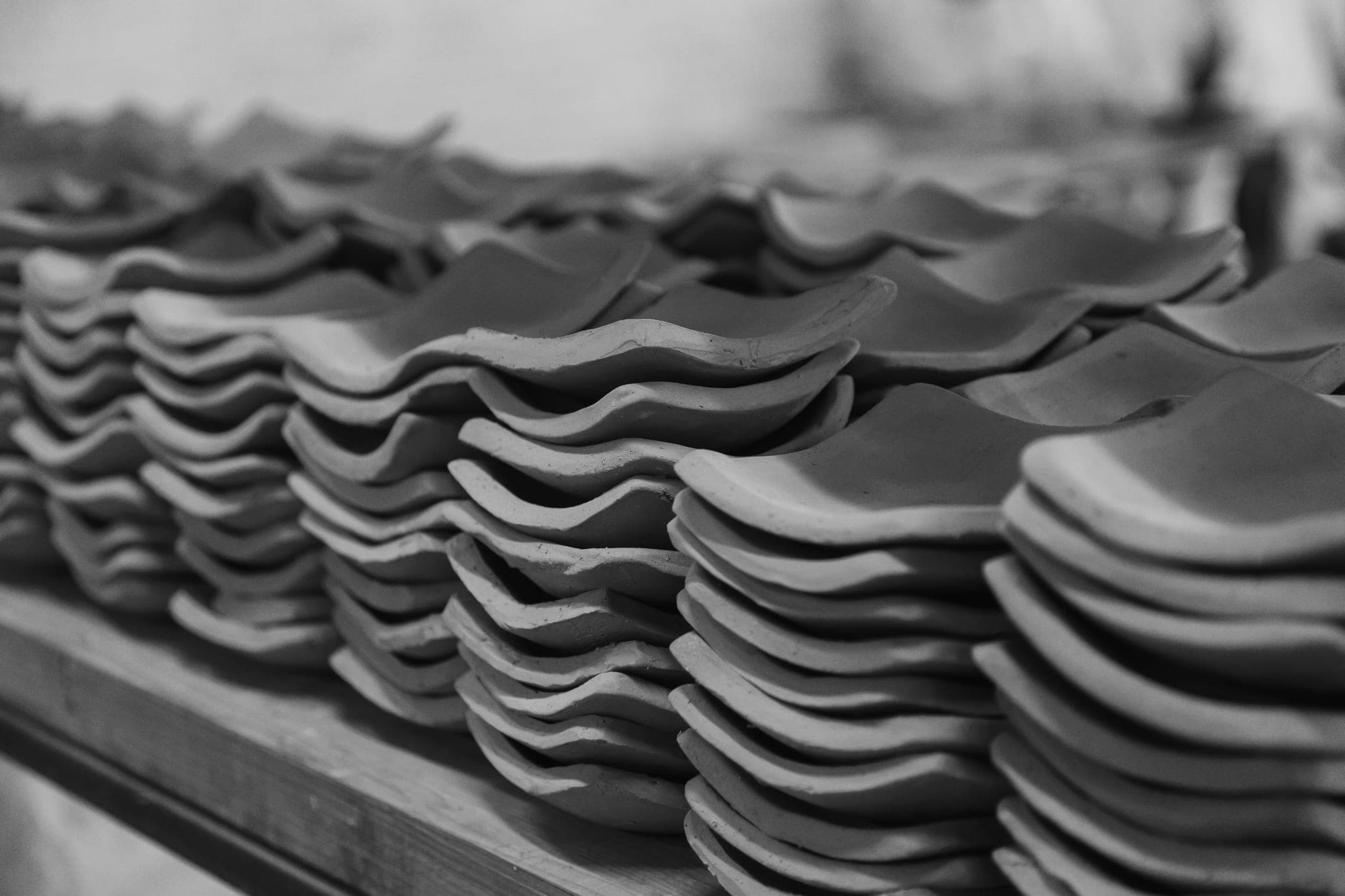 Clay roof tiles in even stacks